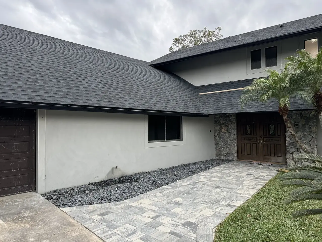 Finished stucco restoration on a two story Orlando home by ZLS Contractors
