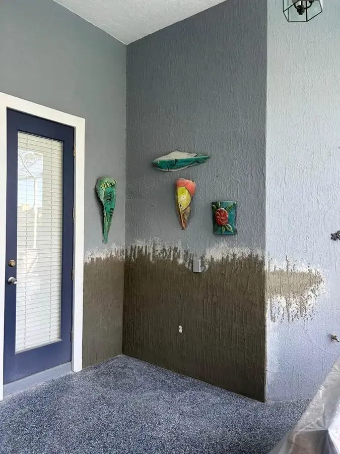 Same lanai wall rebuilt with a new stucco base coat by ZLS Contractors
